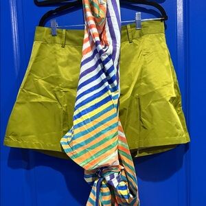 Vibrant Green Shorts with Striped backless shirt